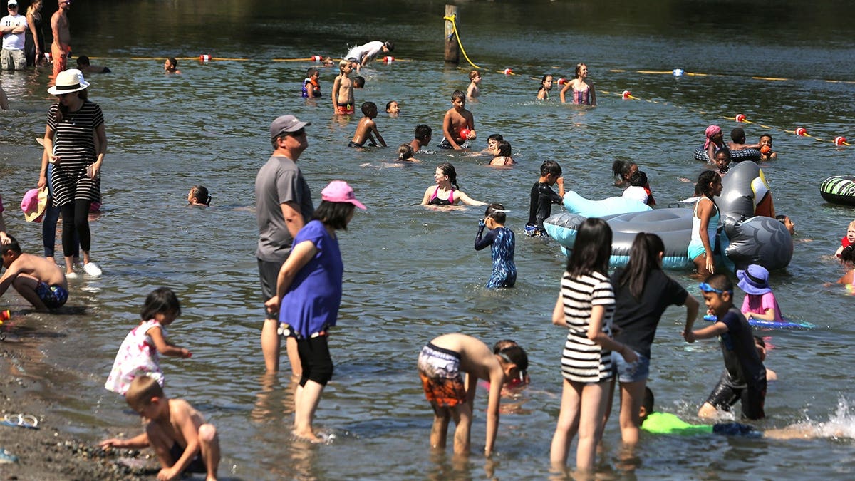 View of people swimming during Seafair
