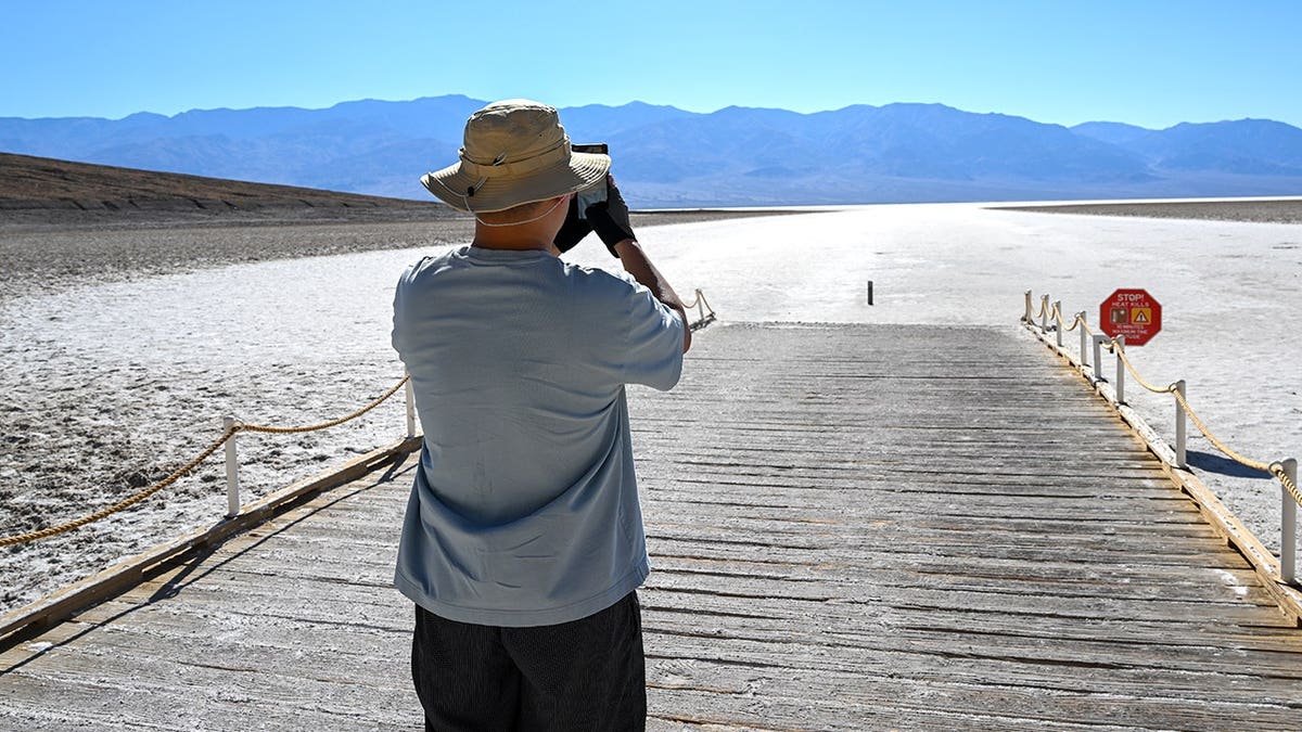 Tourist taking picture at Death Valley