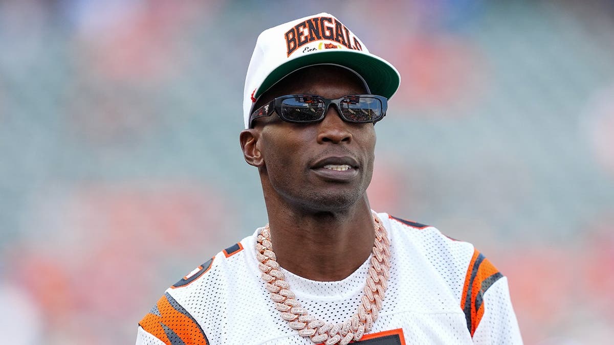 Chad Ochocinco Johnson looks on before an NFL game at Paycor Stadium.