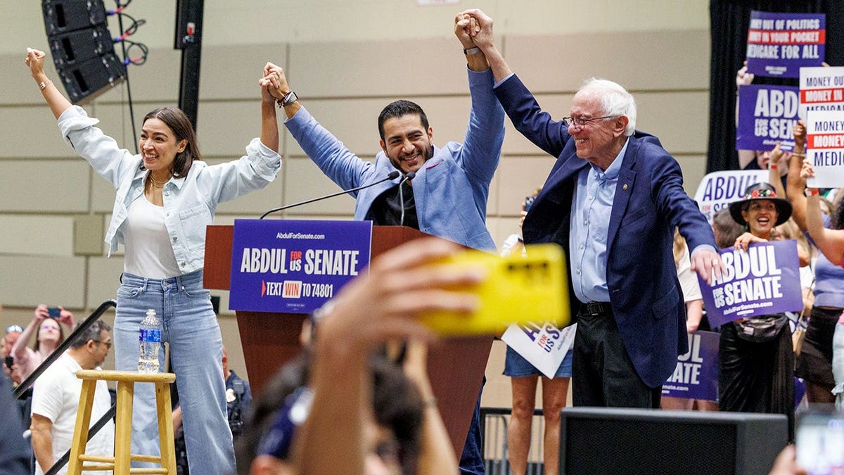 AOC, El-Sayed and Bernie at a rally