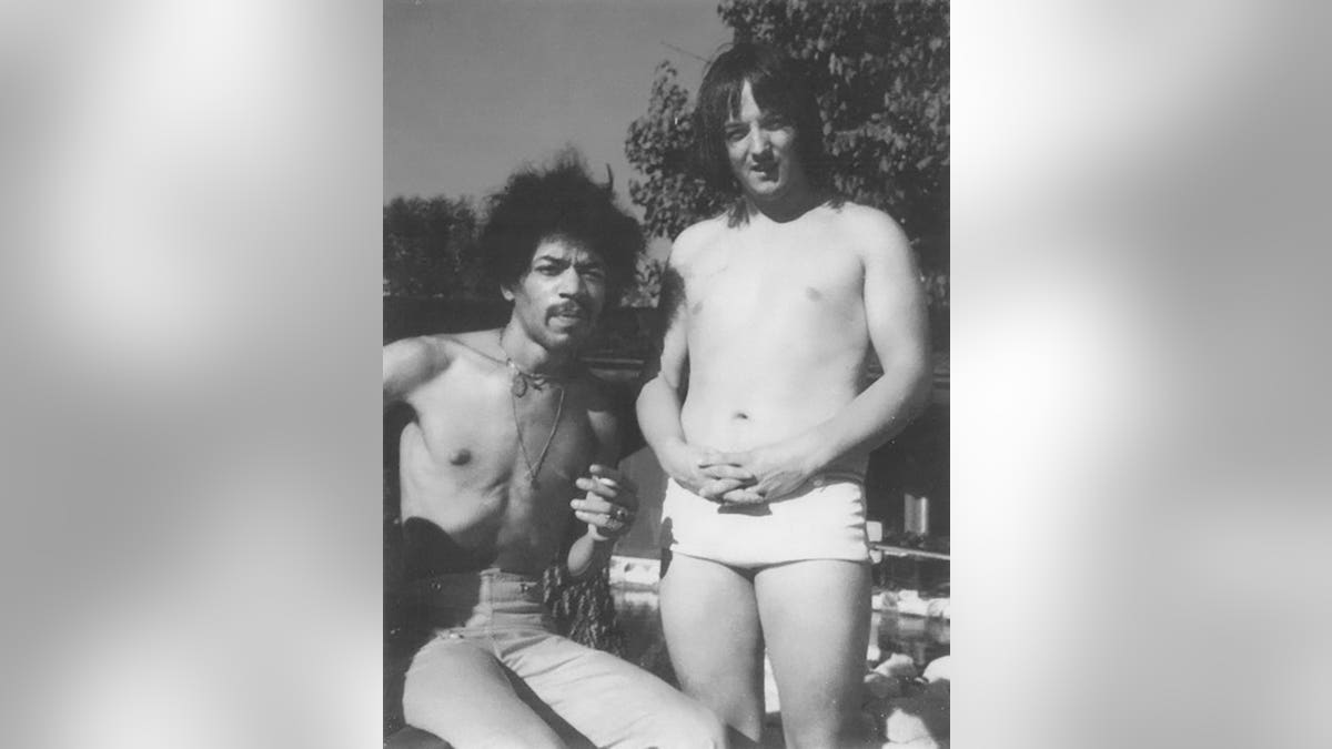 Jimi Hendrix and Eric Barrett at a pool in Benedict Canyon.