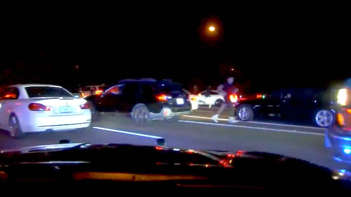 A person ran between stopped vehicles during a street takeover on Interstate 75 as a Florida Highway Patrol trooper arrived.