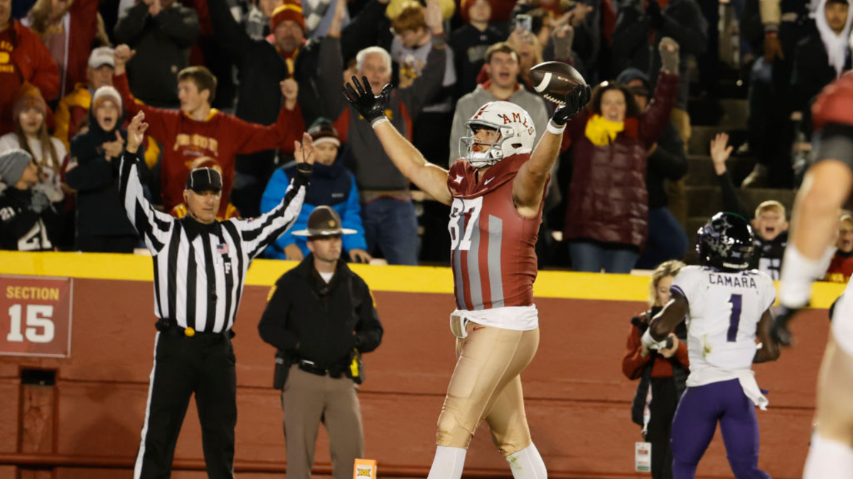 Easton Dean celebrates a touchdown as Abe Camara defends during Iowa State's game against TCU.
