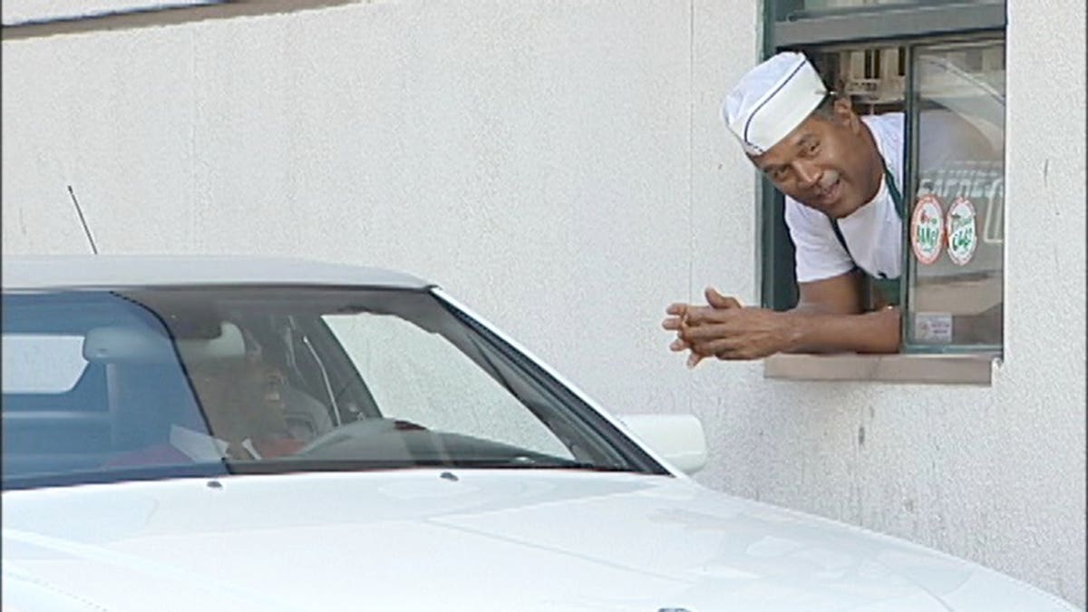 O.J. Simpson posing as a drive-thru worker.