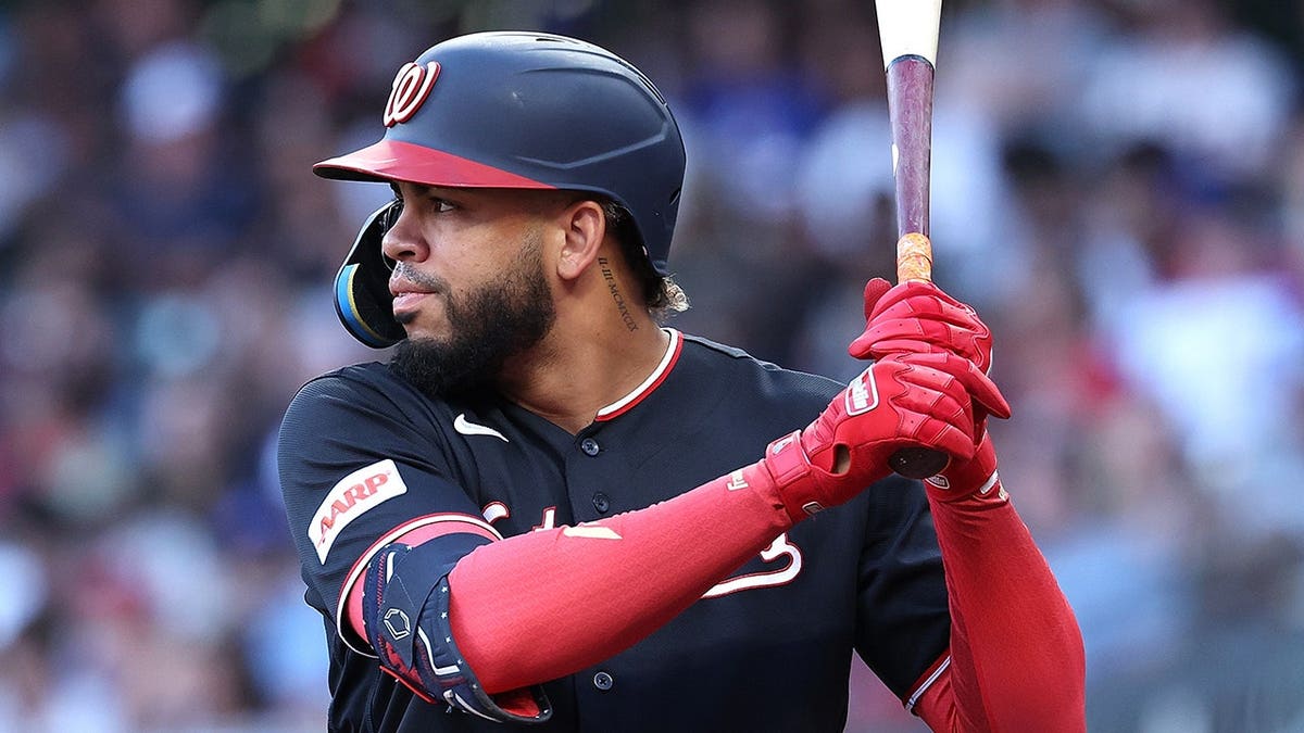 Luis García Jr. bats during a baseball game at Truist Park.