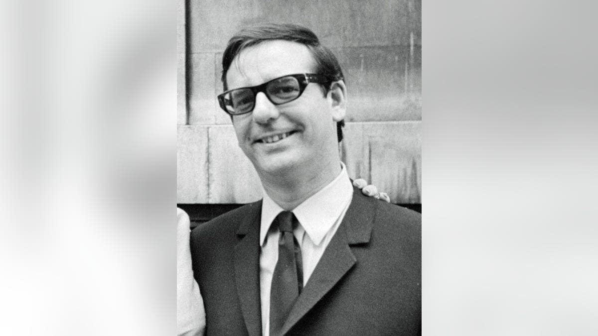 Michael Jeffrey stands outside Marylebone Register Office in June 1965.