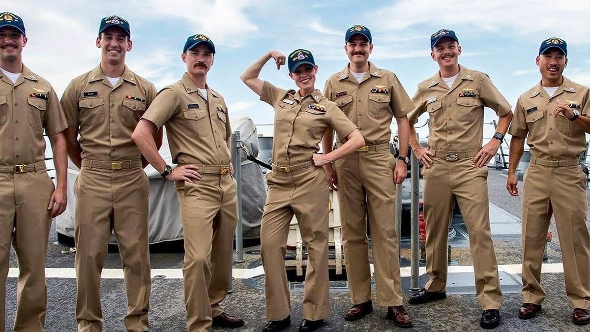 Jade Kircus posing with her crew in the Navy.