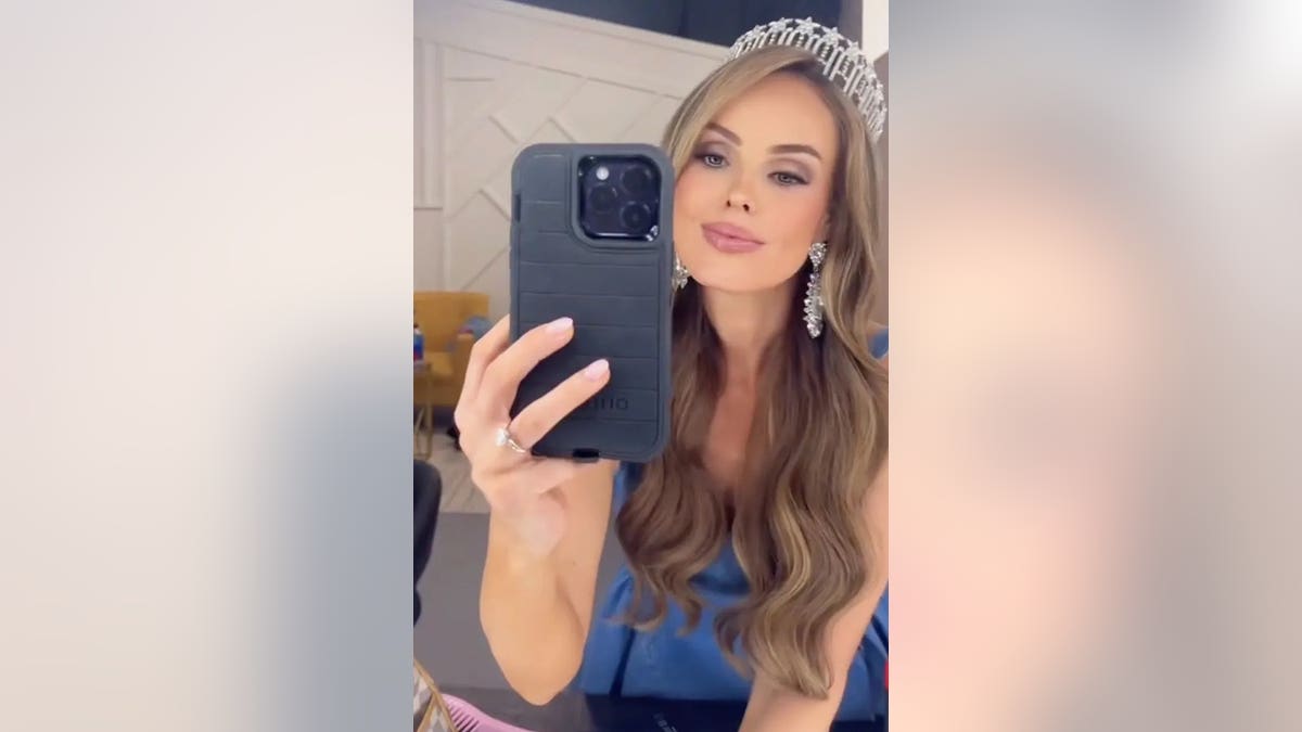 Jade Kircus taking a selfie in a tiara.