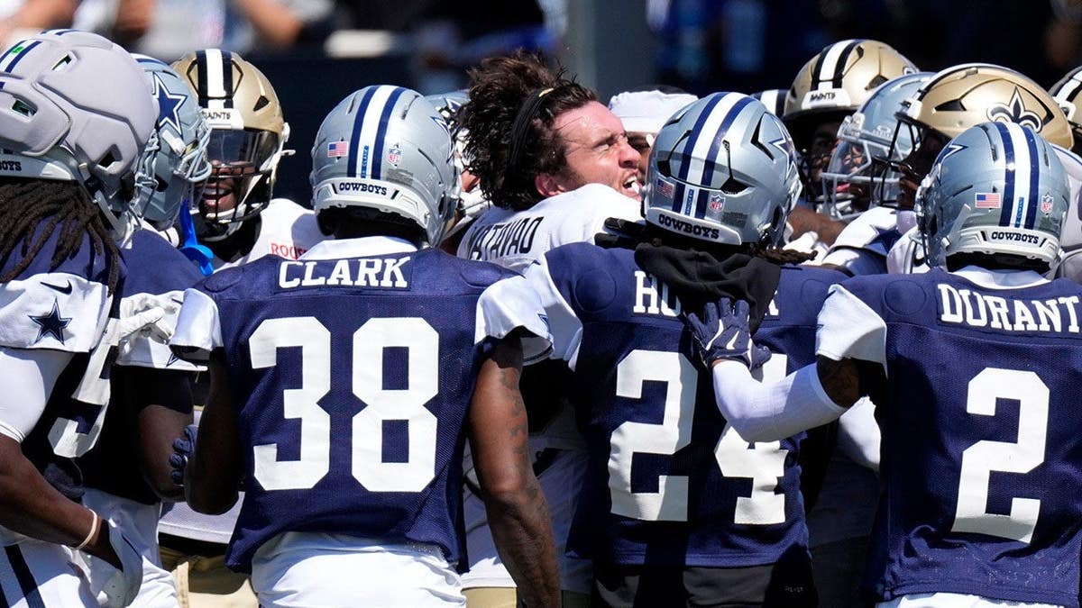 New Orleans Saints receiver Ronnie Bell fights with members of the Dallas Cowboys during a joint practice in Oxnard, Calif., on Aug. 18, 2026. Credit Mark J. Terrill/Associated Press