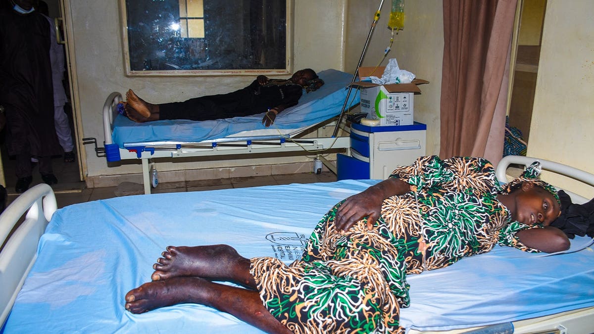 Women who were rescued after being held in a forest after they were abducted from the Woro community by gunmen in February receive medical attention at a hospital in Ilorin, Nigeria, Friday, Aug. 7, 2026.