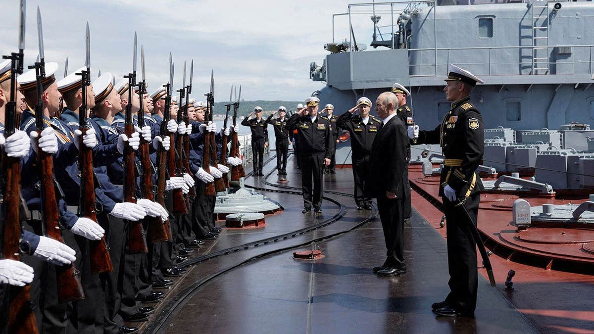 Russian President Vladimir Putin observes a military drill of Pacific fleet