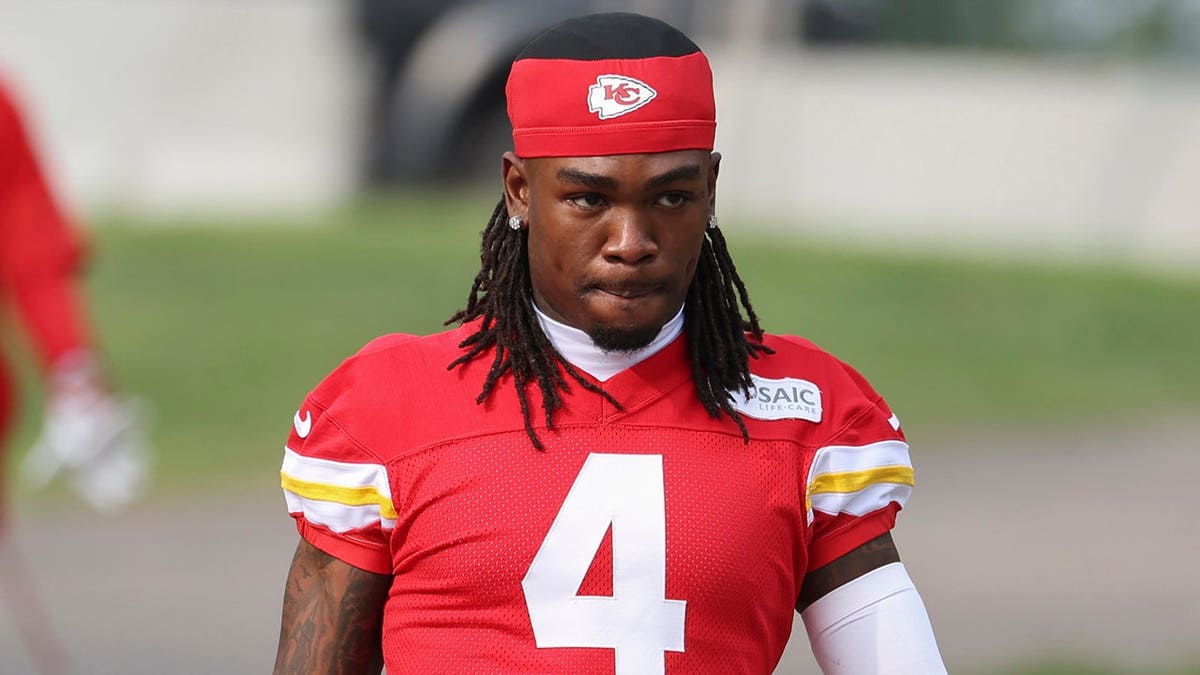 Rashee Rice walks to the field before practice at Kansas City Chiefs training camp.