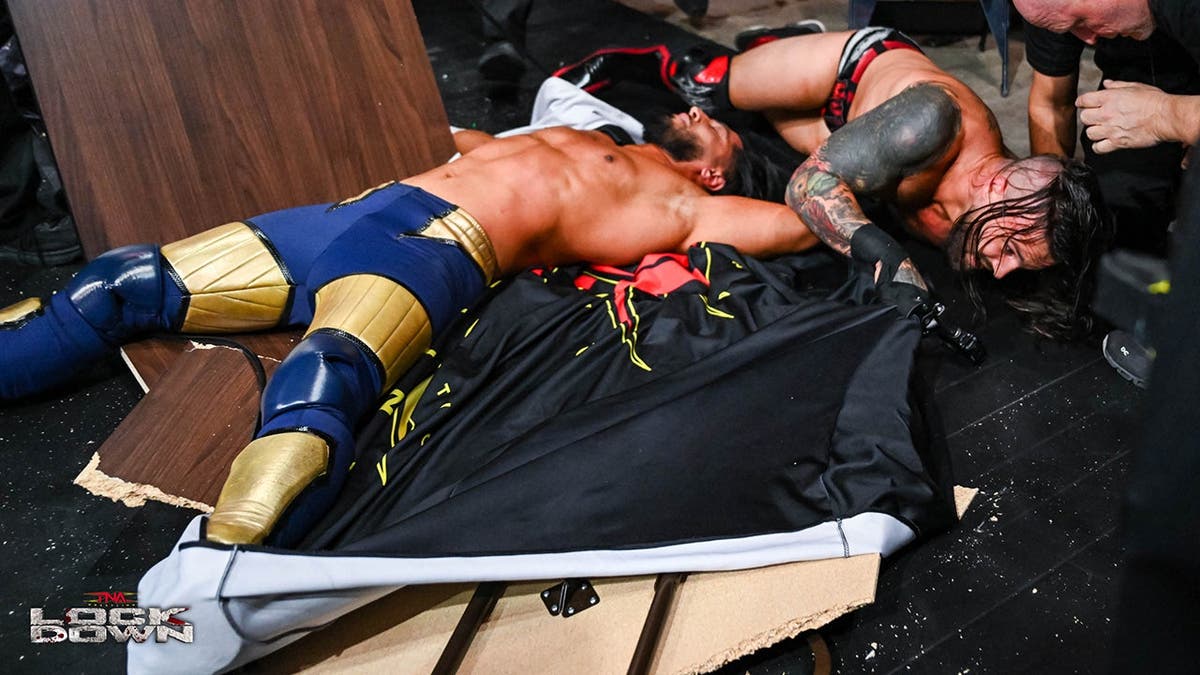 Jason Hotch and Mustafa Ali on the ground