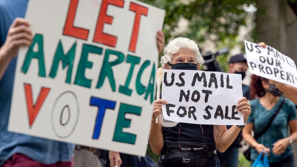 Postmaster general's home is protested by Trump critics over mail-in ballot concerns