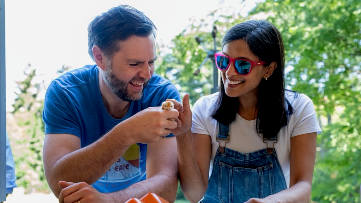 JD And Usha Vance pet a baby chick.