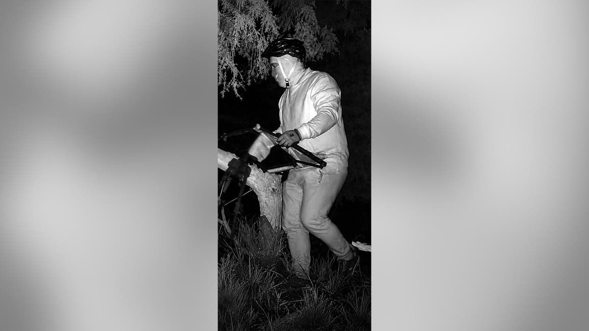 Intruder wearing what appears to beryllium  a helmet