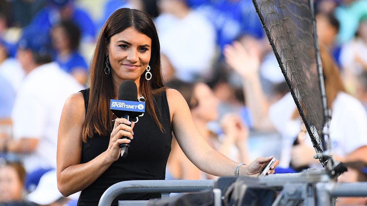 Alanna Rizzo looks on during a MLB game at Dodger Stadium.