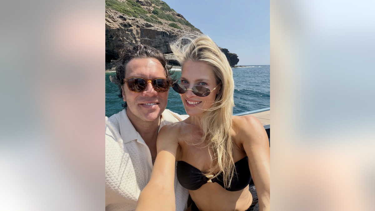 Ali Larter in a black bikini with her husband