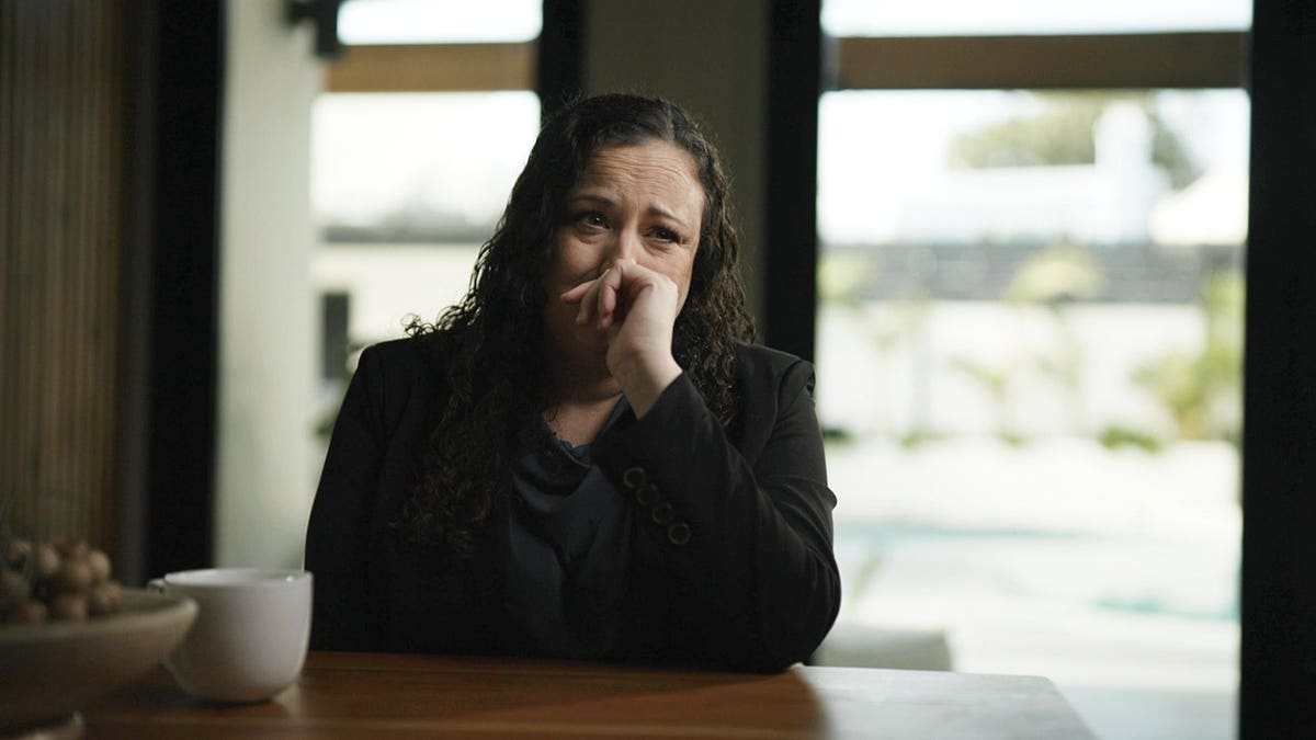 Audrey cries during an interview.
