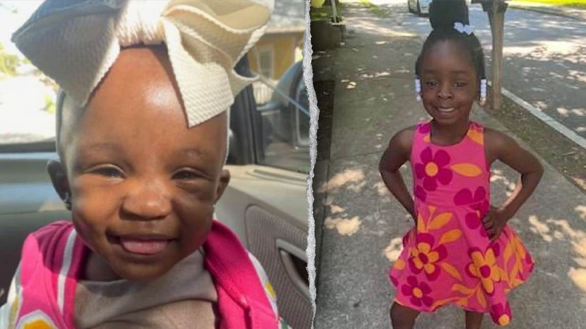The two young girls smiling.