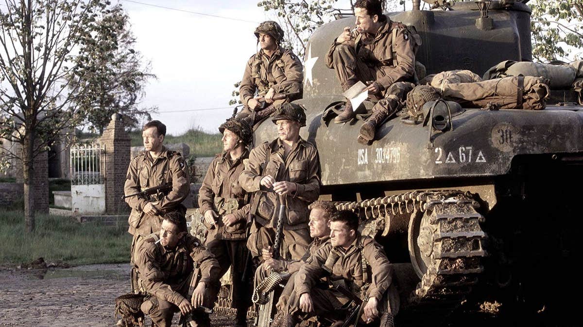 Cast members from HBO's Band of Brothers act in a scene together.
