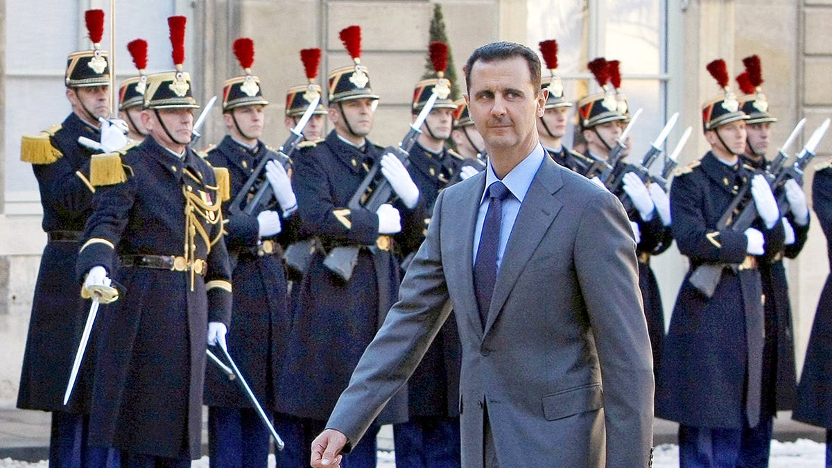 Bashar al-Assad arrives at the Elysee Palace in Paris for a meeting with French President Nicolas Sarkozy.