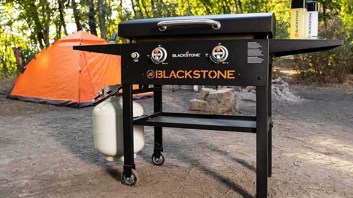 Easily move the griddle with built-in wheels.