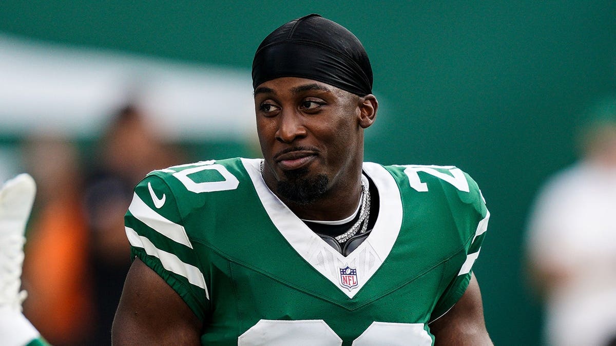 Breece Hall #20 of the New York Jets looks on before a game at MetLife Stadium.