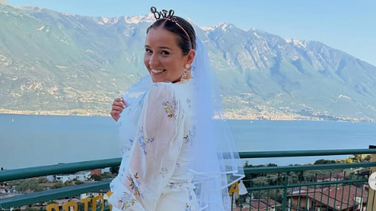 Polly Bibby with a bride headband and wedding veil.