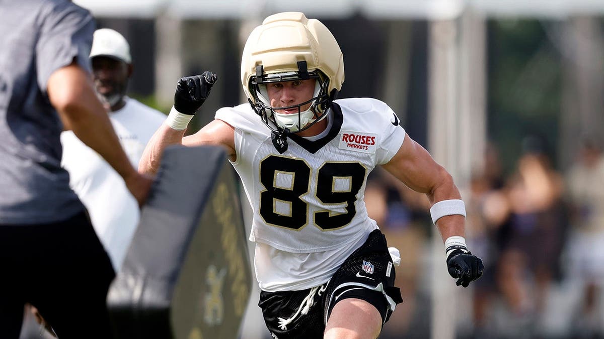 Brock Rechsteiner participates in drills during New Orleans Saints training camp.