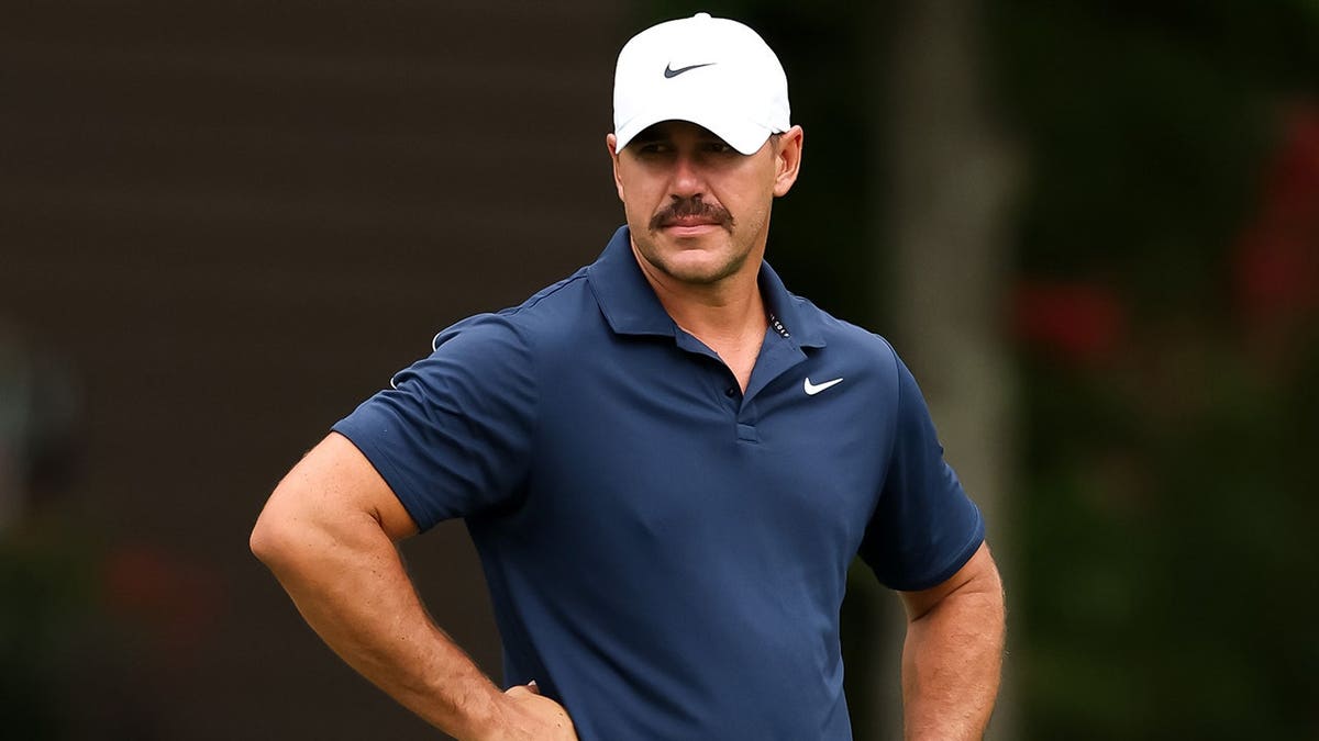 Brooks Koepka looks on from the fourth green during the Pro Am.