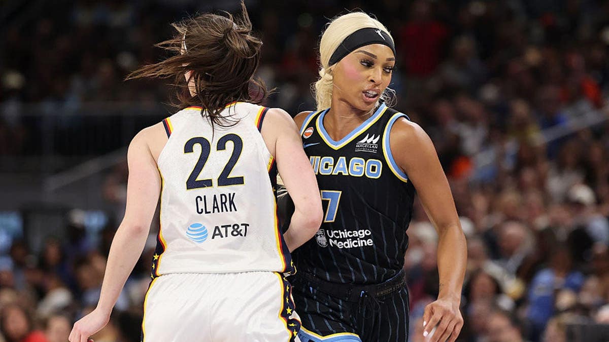 Caitlin Clark and DiJonai Carrington collide during a basketball game at Wintrust Arena.