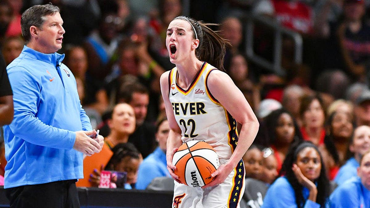 Caitlin Clark reacts during a WNBA game at State Farm Arena.