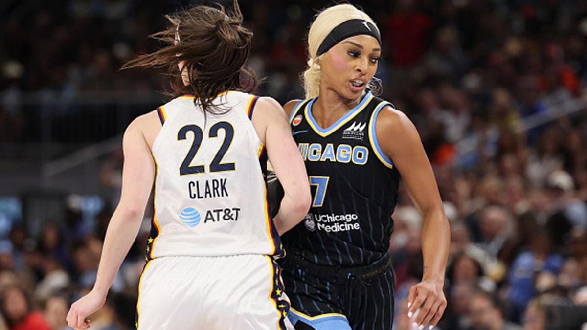 Caitlin Clark #22 and DiJonai Carrington #7 collide during a WNBA game at Wintrust Arena.