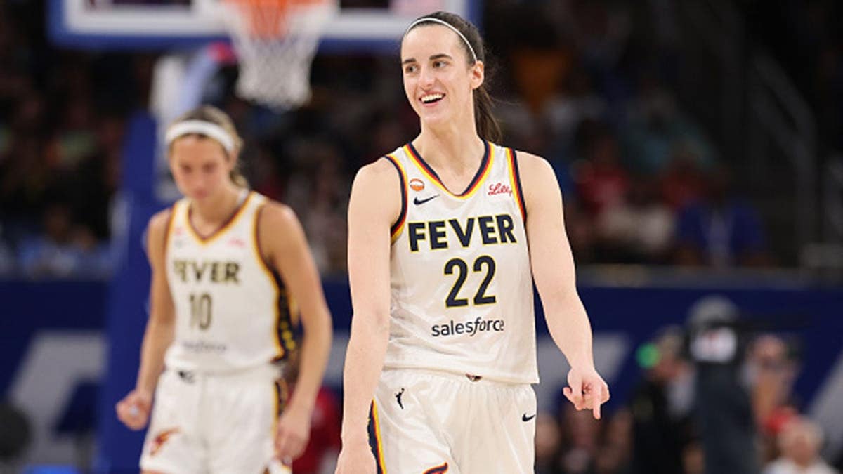 Caitlin Clark #22 reacts before a game at Wintrust Arena.