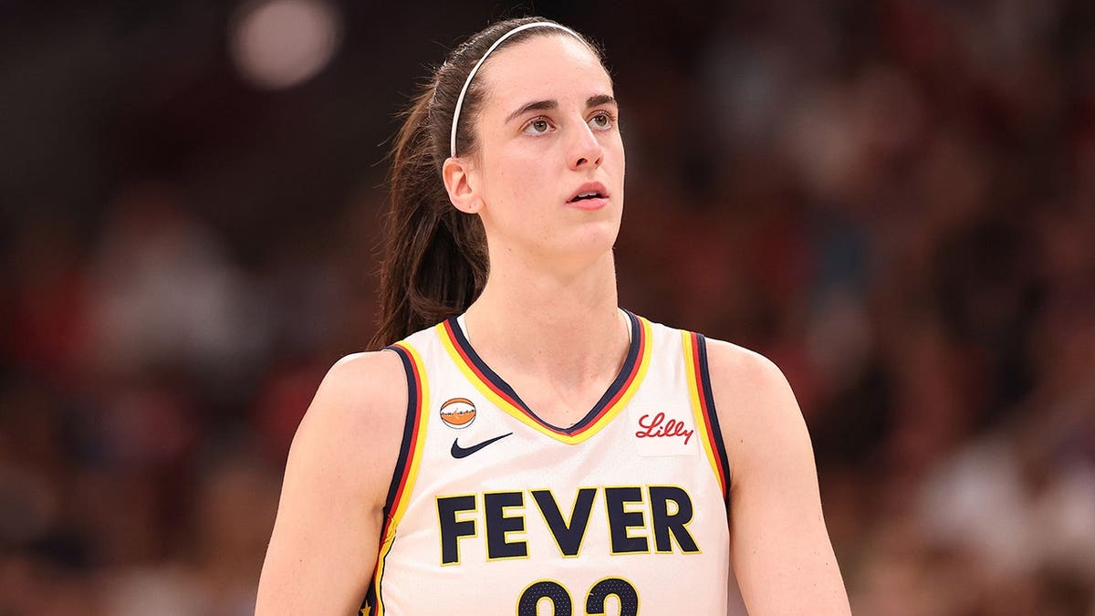 Caitlin Clark reacts during a game against the Chicago Sky at United Center.