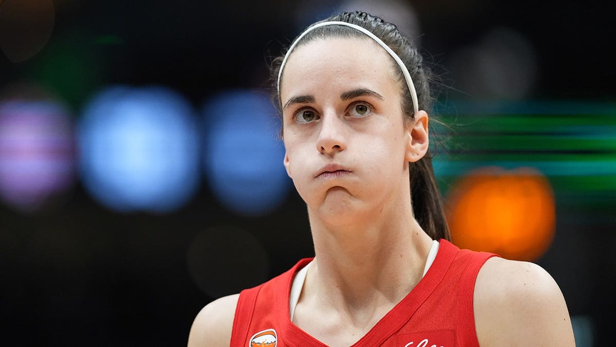 Caitlin Clark #22 reacts during the second half against the Seattle Storm.