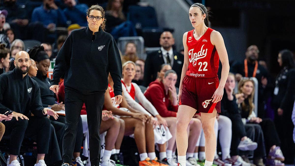 Head coach Stephanie White and Caitlin Clark #22 of the Indiana Fever