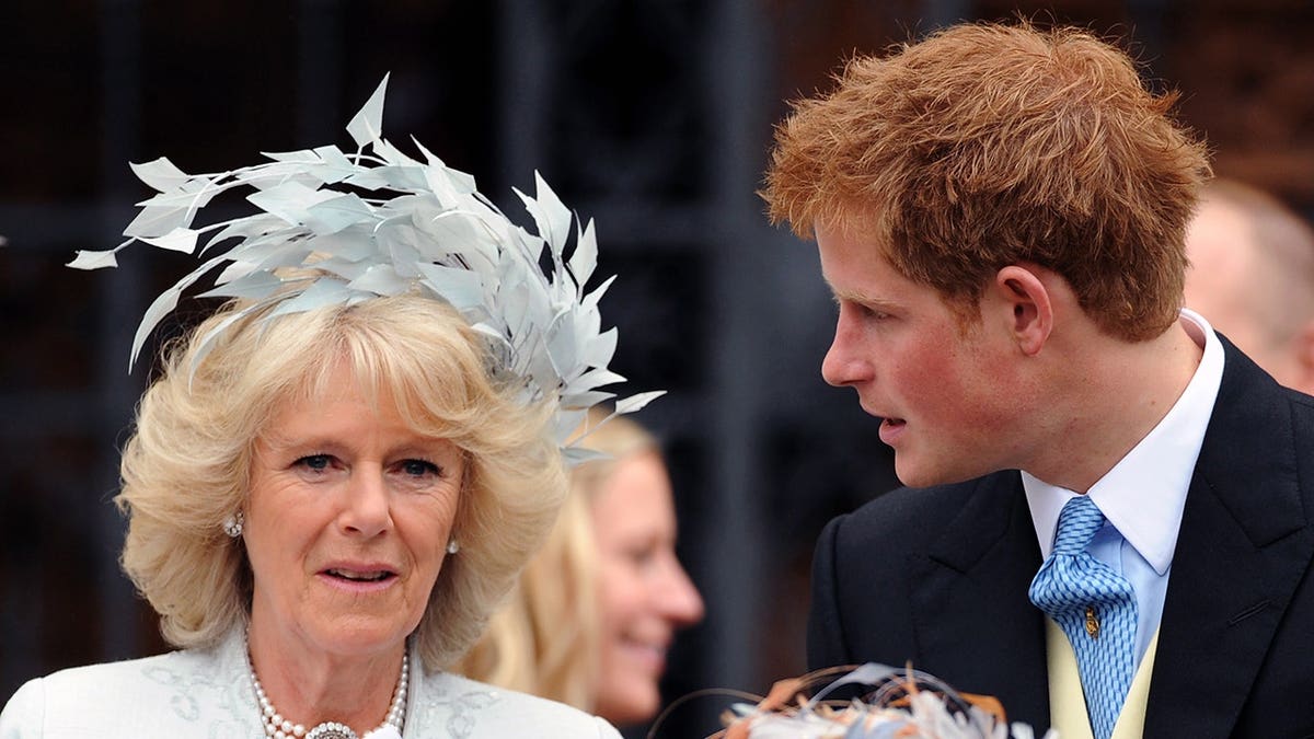 Prince Harry and Camilla, Duchess of Cornwall, attend a wedding at St. George's Chapel in Windsor.