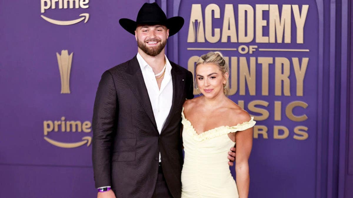 Jake Ferguson and Haley Cavinder attend the Academy of Country Music Awards.