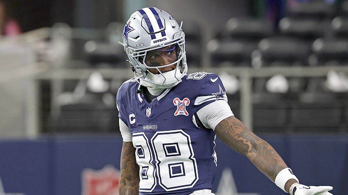 CeeDee Lamb warms up before a game at AT&T Stadium.