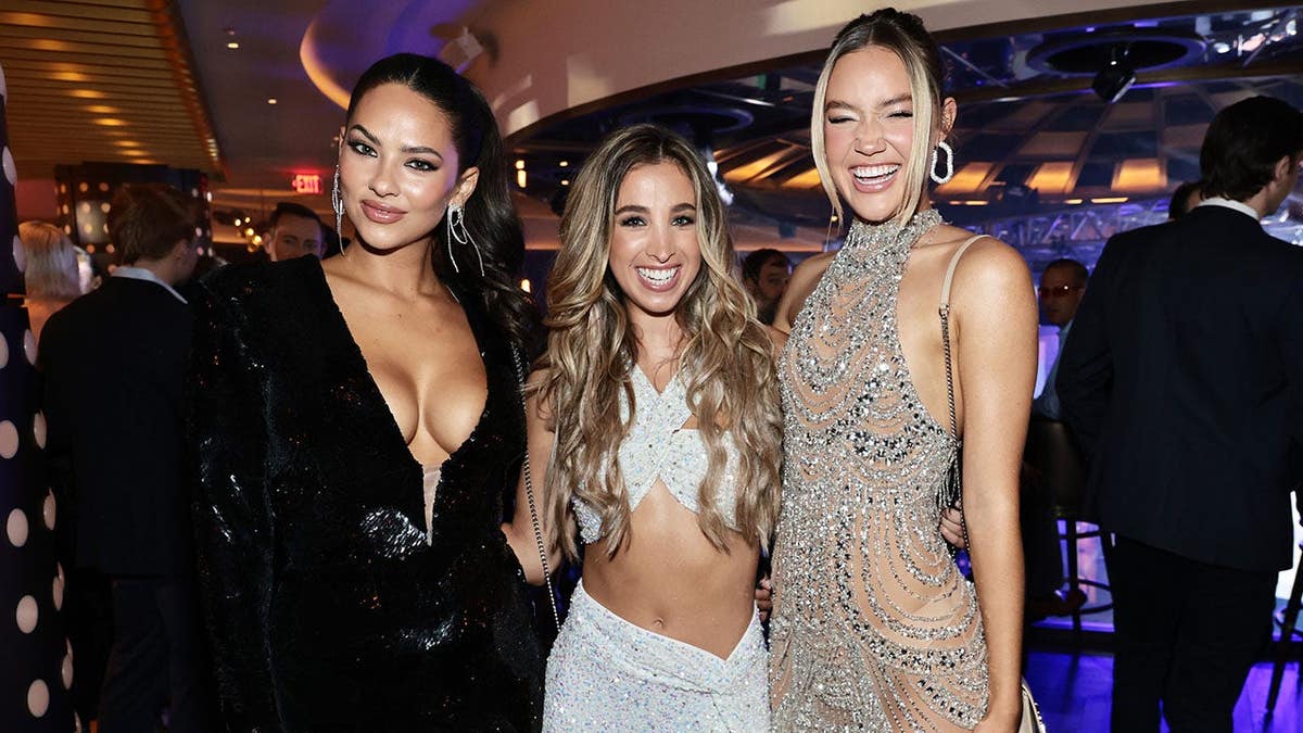 Christen Harper, Katie Austen and Olivia Ponton attend Sports Illustrated Swimsuit event at Hard Rock Hotel New York.