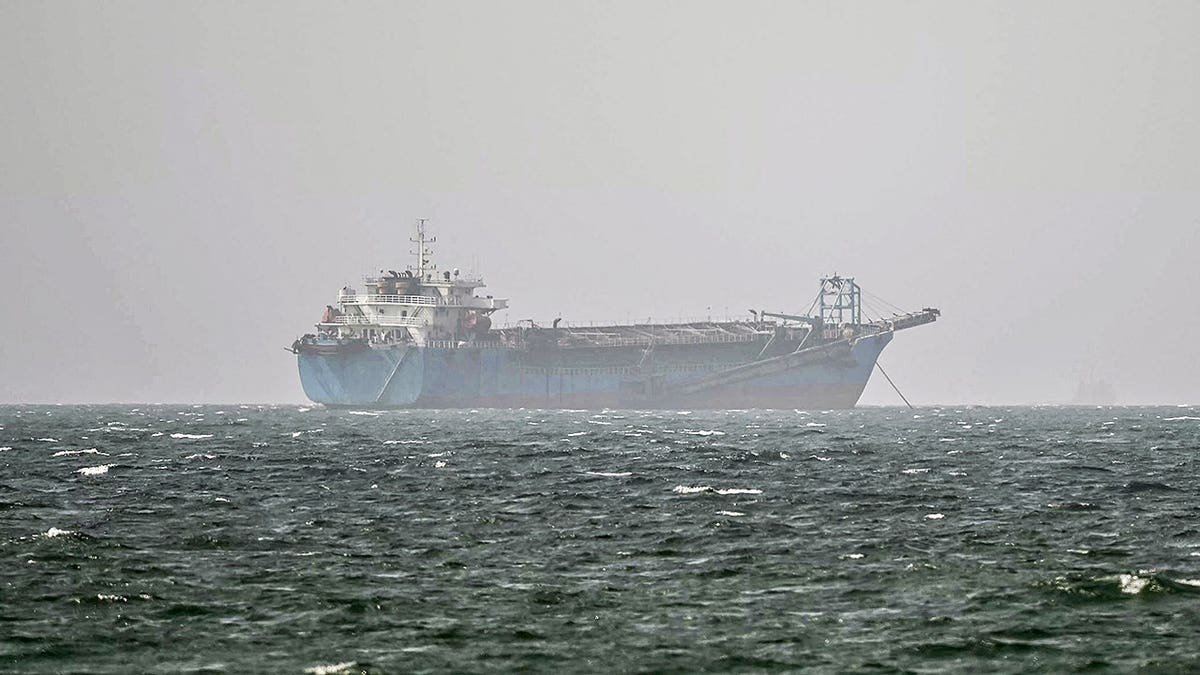 A vessel near Strait of Hormuz is anchored off the coast of Sharjah, United Arab Emirates