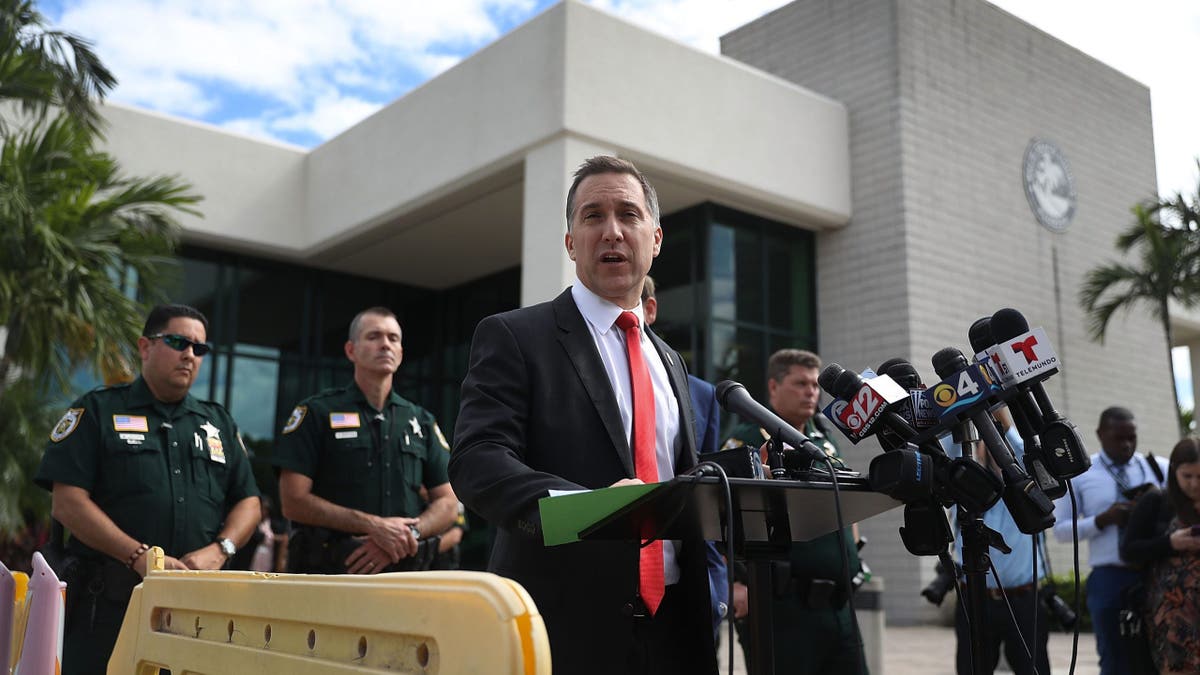 Palm Beach County State Attorney Dave Aronberg speaks to the media after Tiger Woods pleaded guilty at the North County Courthouse to reckless driving on Oct. 27, 2017, in Palm Beach Gardens, Fla. In May, Jupiter police found Woods asleep at the wheel of his idling Mercedes.