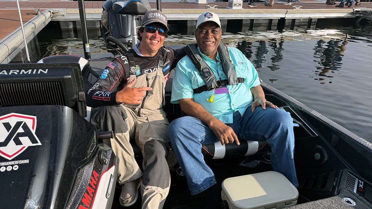 Justin Hamner and Dave Robinson relax in their boat