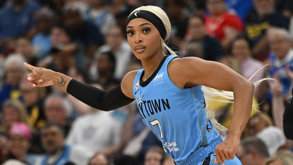 DiJonai Carrington celebrates after making a basket during a WNBA game.