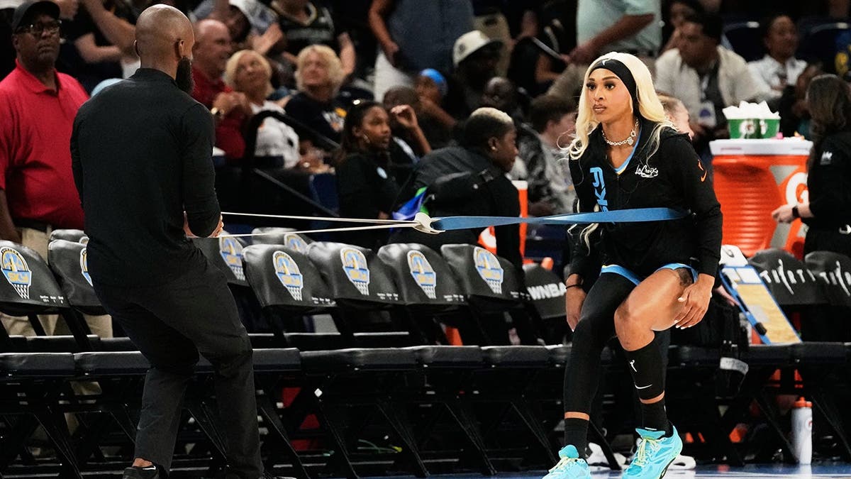DiJonai Carrington warms up before a WNBA game in Chicago.