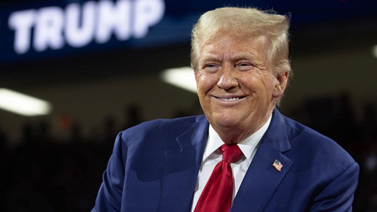 Donald Trump speaks at a campaign event at the Dort Financial Center in Flint, Michigan.