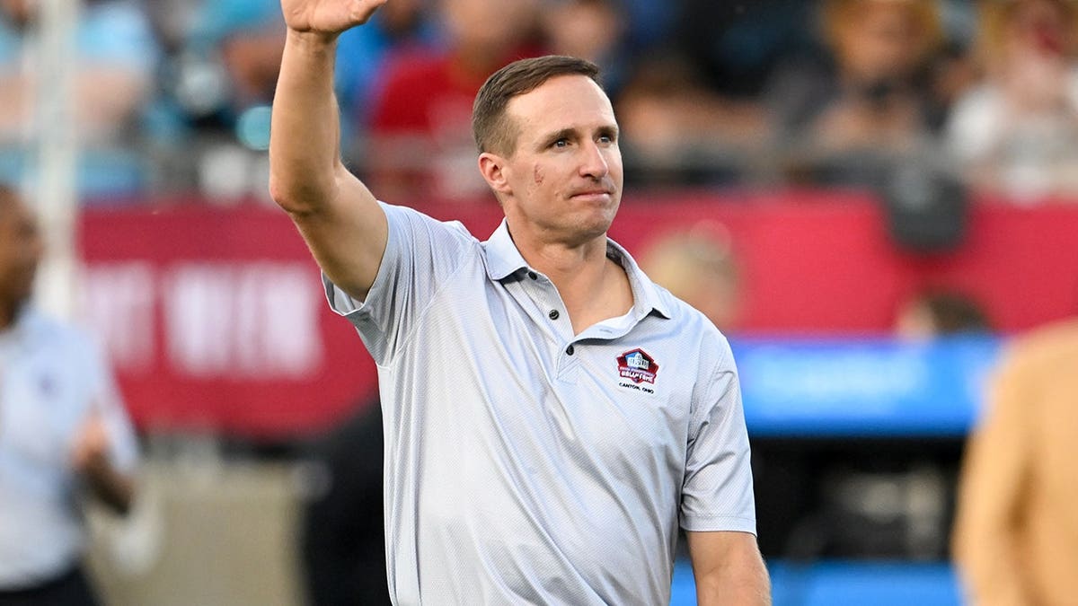 Drew Brees is introduced before the Pro Football Hall of Fame Game at Tom Benson Hall of Fame Stadium in Canton, Ohio.
