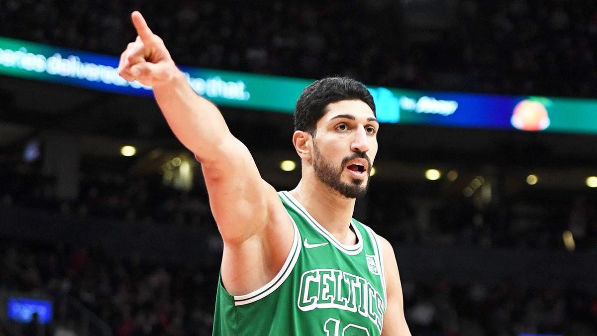 Enes Kanter gestures during a Boston Celtics game against the Toronto Raptors.